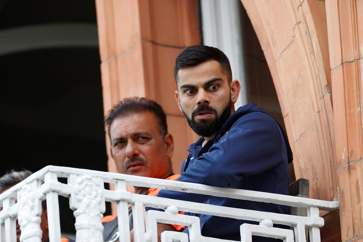 India head coach Ravi Shastri and Virat Kohli during the the second test match at Lord's. (Reuters Photo)