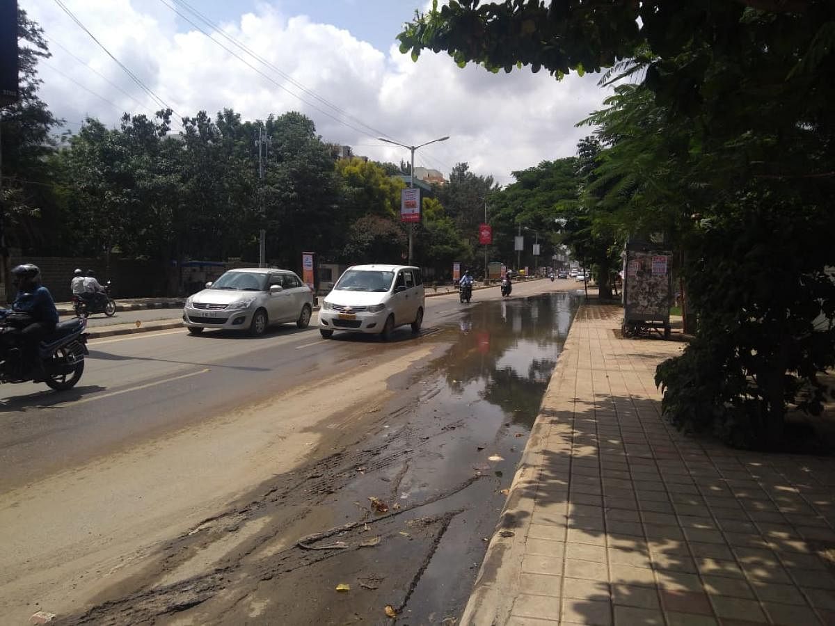 The overflowing stormwater drain on Whitefield Main Road. 