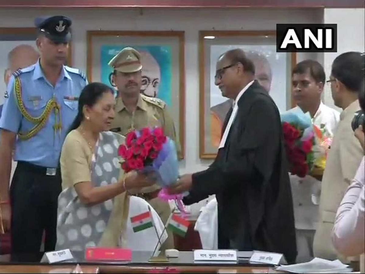 Chhattisgarh High Court Chief Justice Ajay Kumar Tripathi administered the oath of office to Patel during a simple function at the Raj Bhawan. Image courtesy ANI/Twitter.