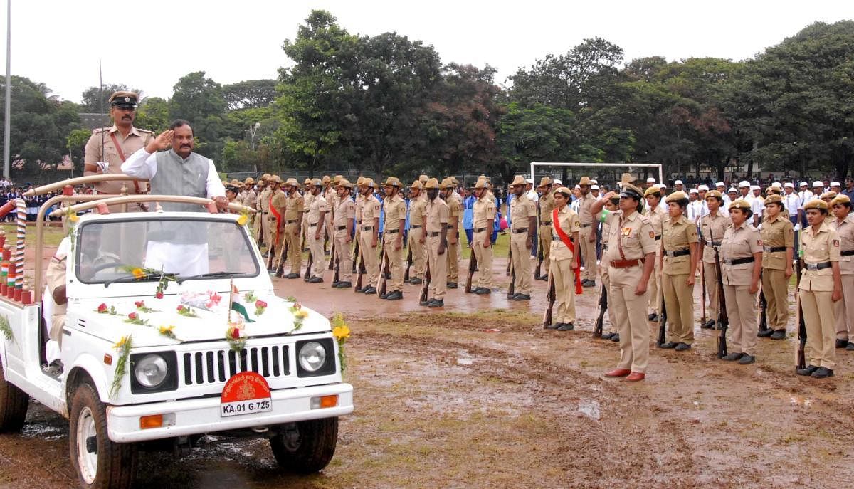District In-charge Minister K J George receives the guard of honour during the 72nd Independence Day programme in Chikkamagaluru on Wednesday.