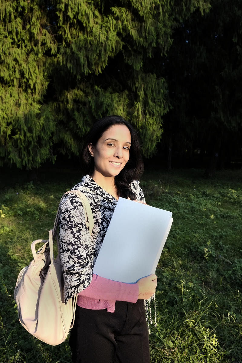 An indian girl going to college for studies in happy moodStudy in India