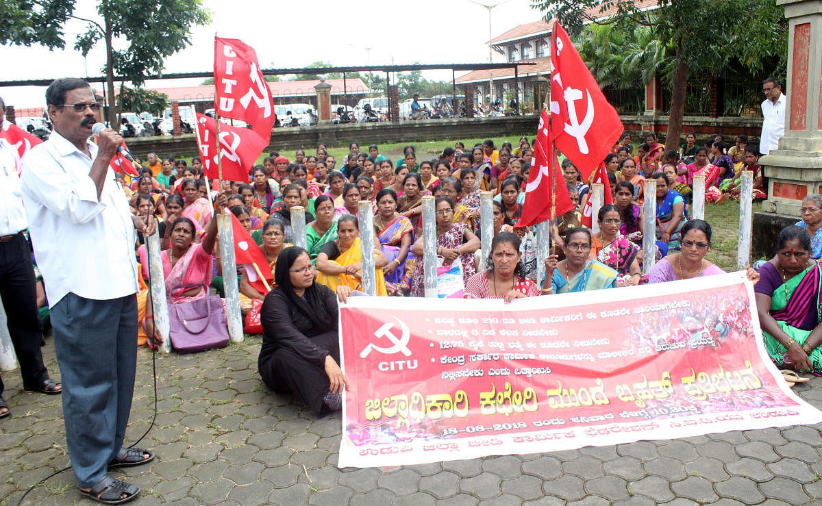 Beedi workers conduct a protest under the aegis of beedi workers federation (CITU), in front of DC’s office in Udupi on Saturday.