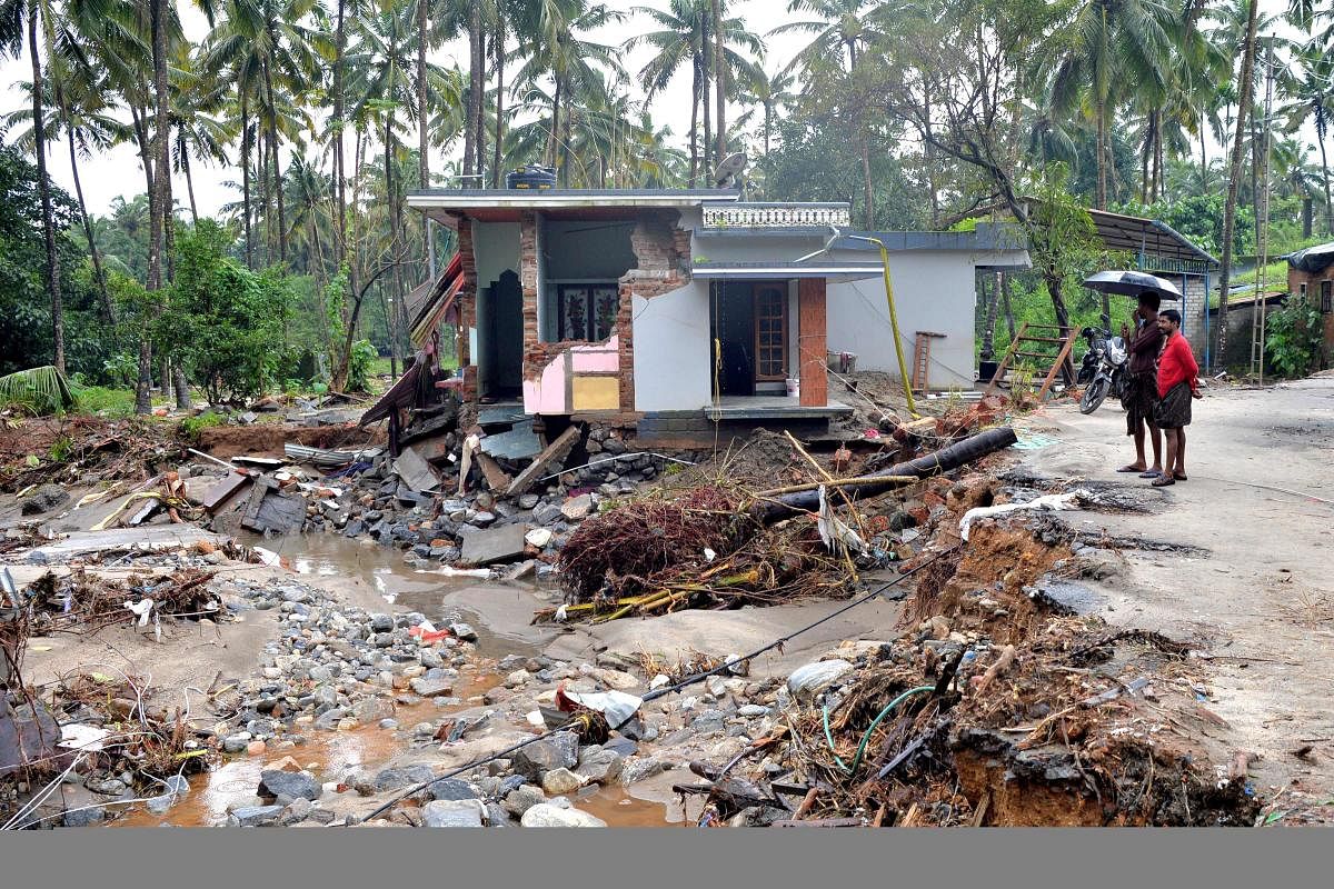 House destroyed by a landslide at Kannapanakundu village, about 422 km north of Trivandrum, Kerala. (AFP Photo)