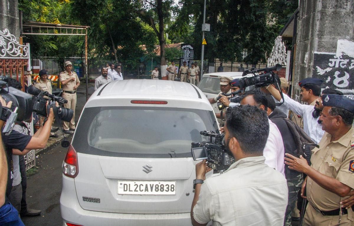 Activist Narendra Dabholkar's alleged shooter Sachin Prakasrao Andure being brought to Pune Sessions Court, in Pune on Sunday. PTI