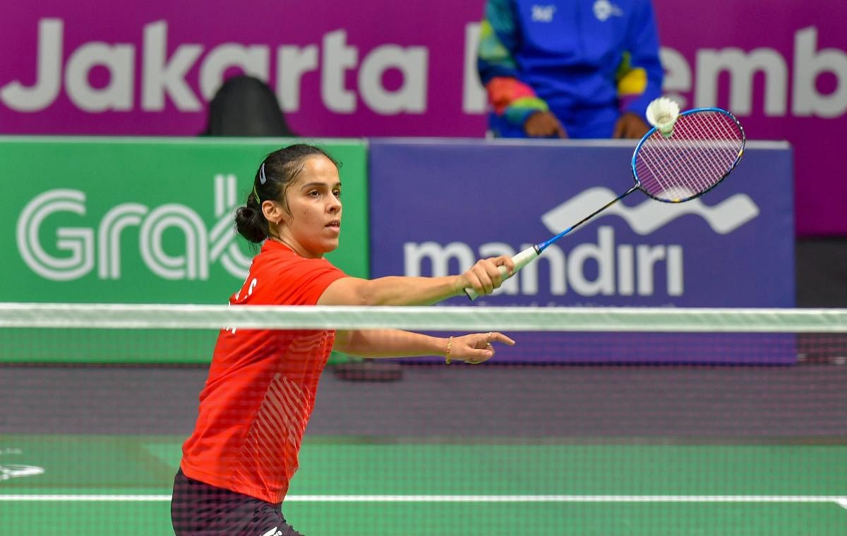 India's Saina Nehwal fought hard but couldn't overcome Japan's Nozomi Okuhara in the team event on Monday. AFP