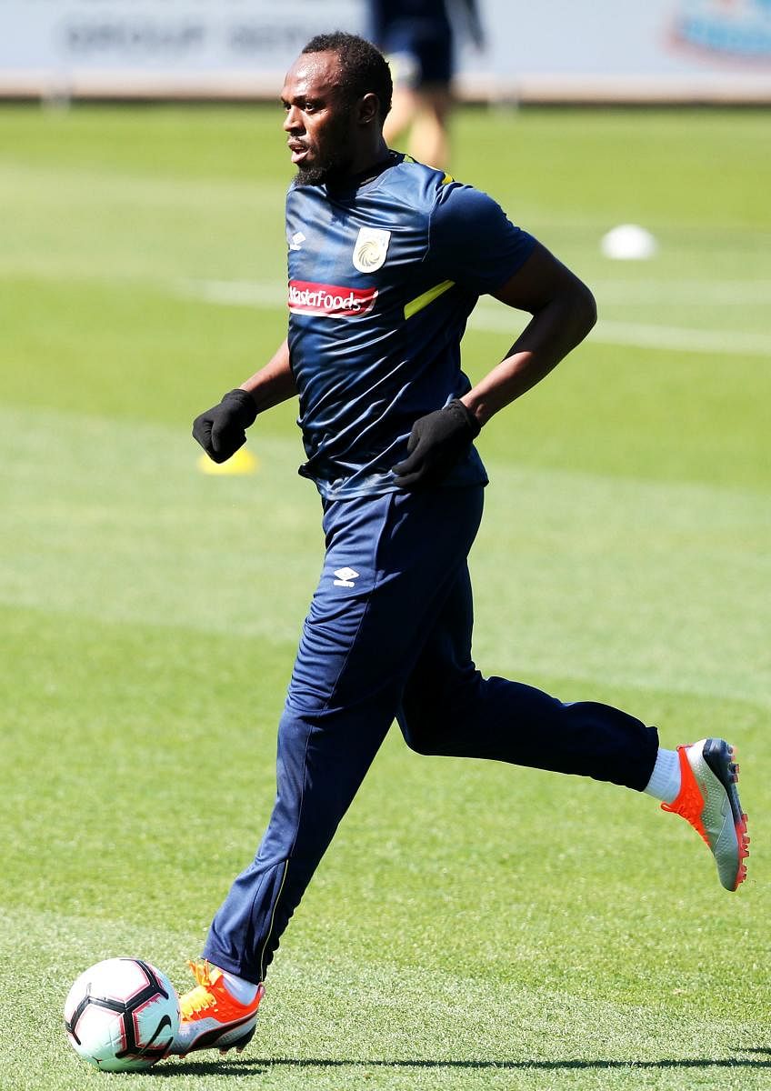 Usain Bolt during a training session with A-League football club Central Coast Mariners on Tuesday. AFP