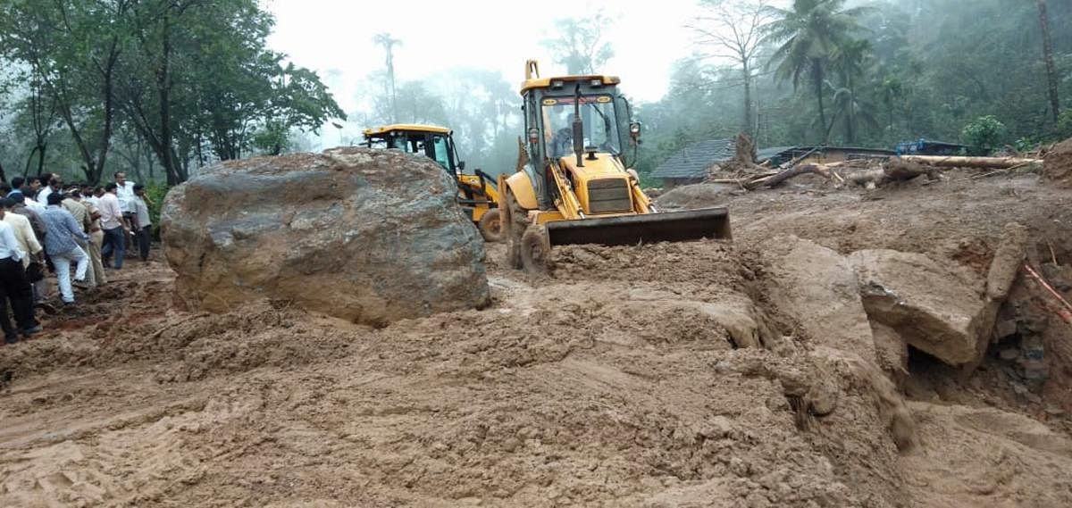 The work on clearing the boulders in progress at Jodupala, Kodagu district.