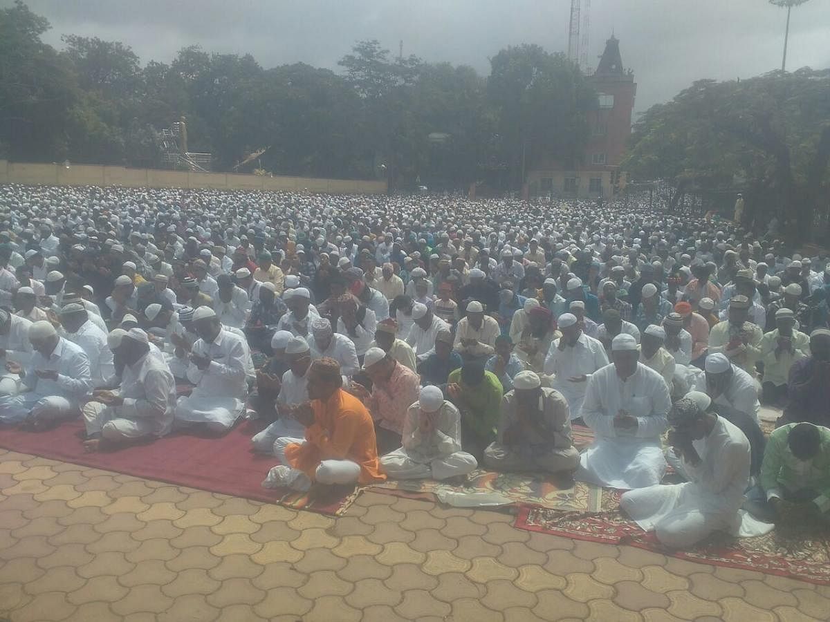 Thousands of Muslims gather for the Bakrid mass prayer, in Hubballi, on Wednesday. DH photo.