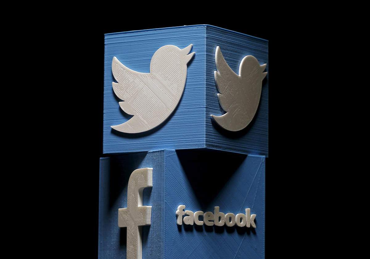 Facebook Inc, Twitter Inc and Alphabet Inc collectively removed hundreds of accounts tied to an alleged Iranian propaganda operation on Tuesday, while Facebook took down a second campaign it said was linked to Russia.