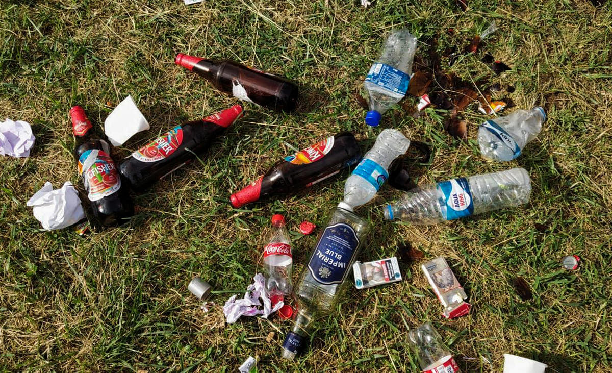 A day after a cultural event organised by the Gorkhali Helping Trust, liquor bottles, cigarette packets and trash seen littered at the Central College Ground on Wednesday. 