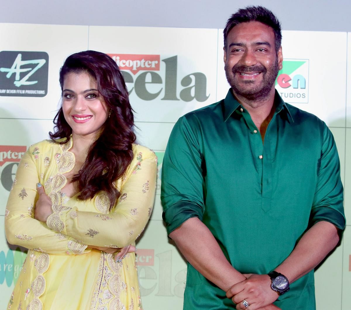 Bollywood actors Kajol Devgn and Ajay Devgn pose for a picture as they celebrate the formers 43rd birthday during the trailer launch of their upcoming Hindi film 'Helicopter Eela', in Mumbai on August 05, 2018. (PTI File Photo)
