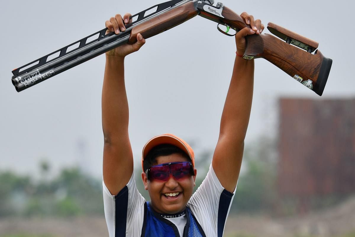 FINE SHOW: India’s Shardul Vihan celebrates after clinching silver in the men’s double trap shooting final in on Thursday. AFP