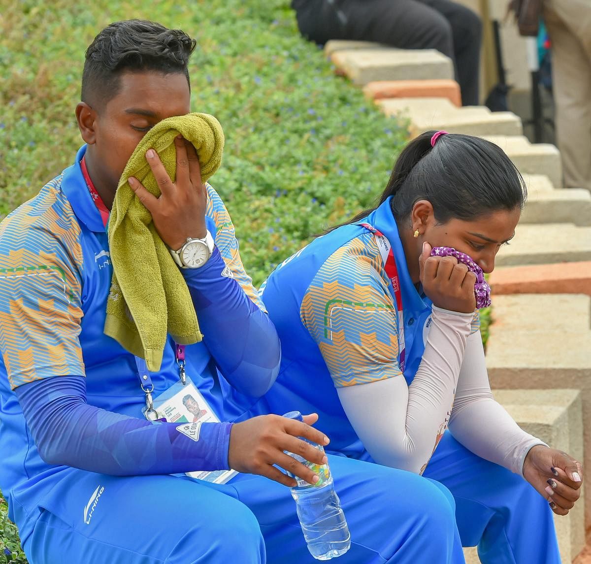 Indian archers Deepika Kumari (right) and Atanu Das look dejected after going down in the recurve in mix team event at the Asian Games on Friday. PTI