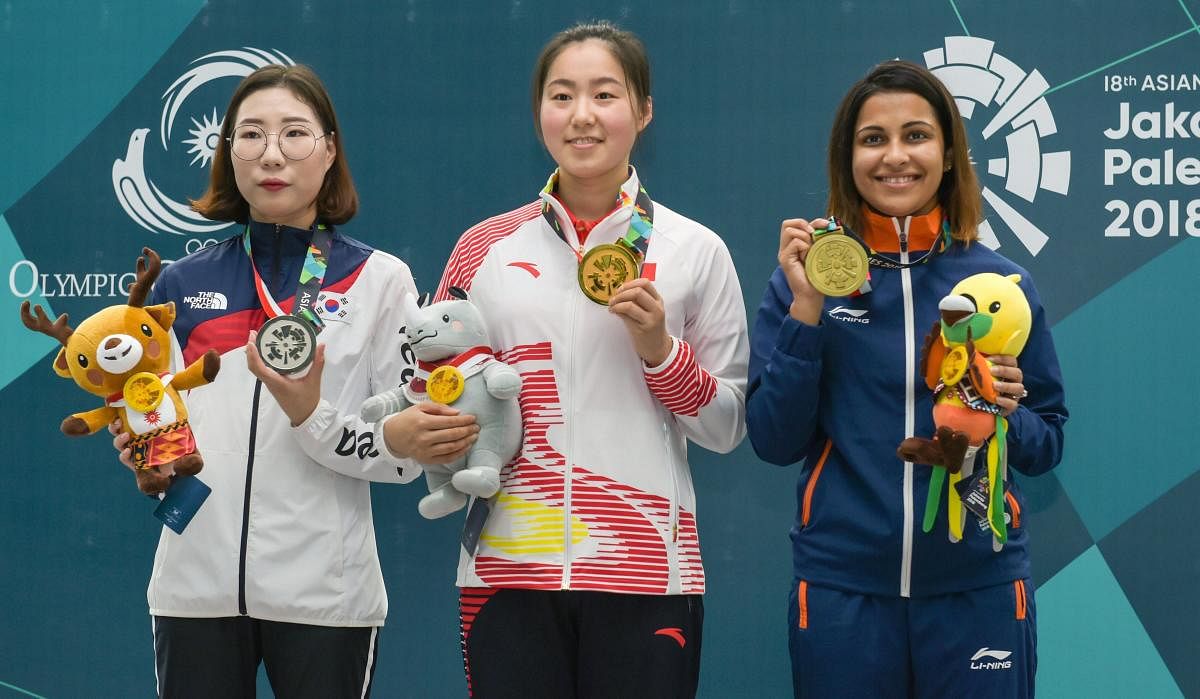 Palembang: Indian shooter Heena Sidhu with other winners poses for photo after winning bronze medal in the 10m Air Pistol at the 18th Asian Games Jakarta Palembang 2018, in Indonesia on Friday. PTI Photo