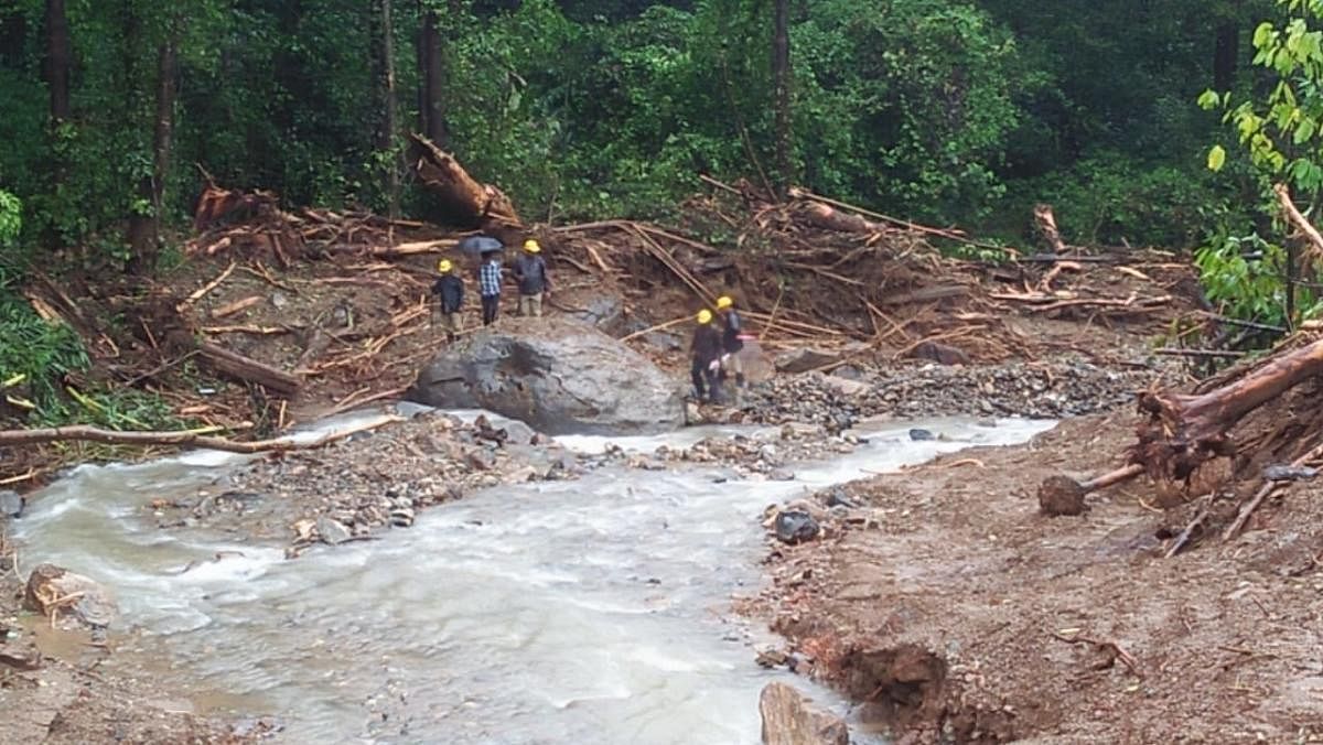 Rescue team search for bodies in Payaswini river near Jodupala.