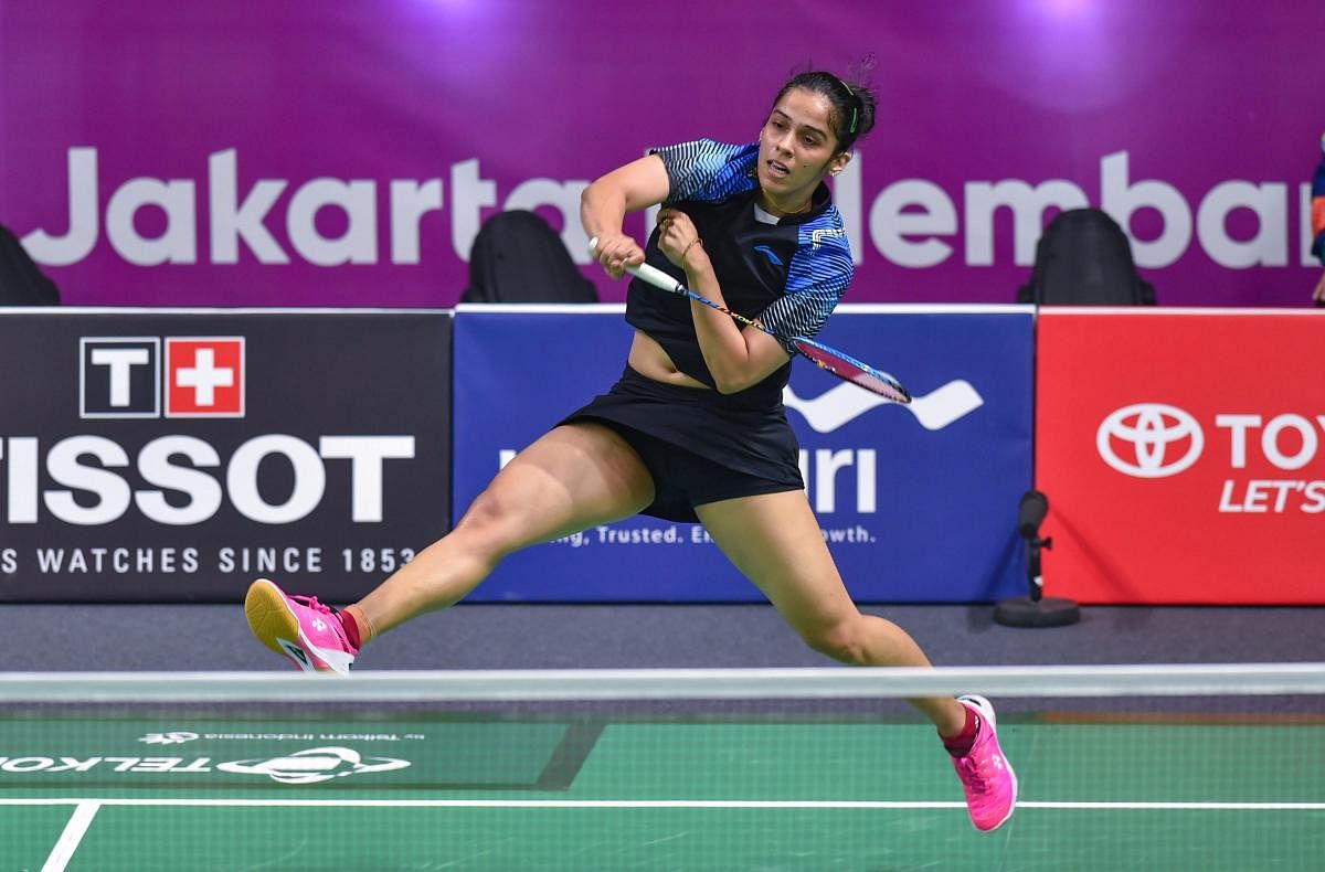 POWERFUL: Shuttler Saina Nehwal essays a smash during her match against Indonesia's Fitriani Fitriani in Jakarta on Saturday. PTI