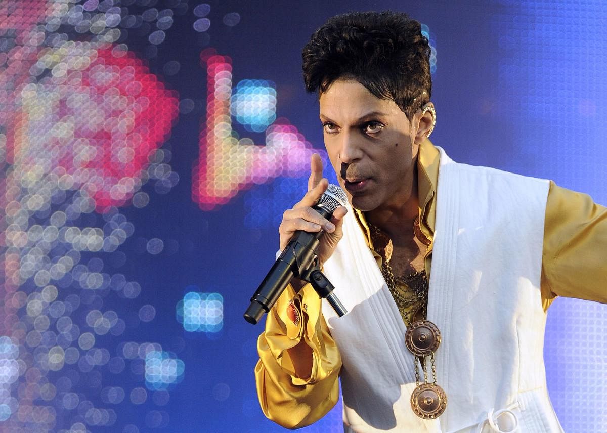 This June 30, 2011 file photo shows US singer and musician Prince performing on stage at the Stade de France in Saint-Denis, outside Paris. AFP