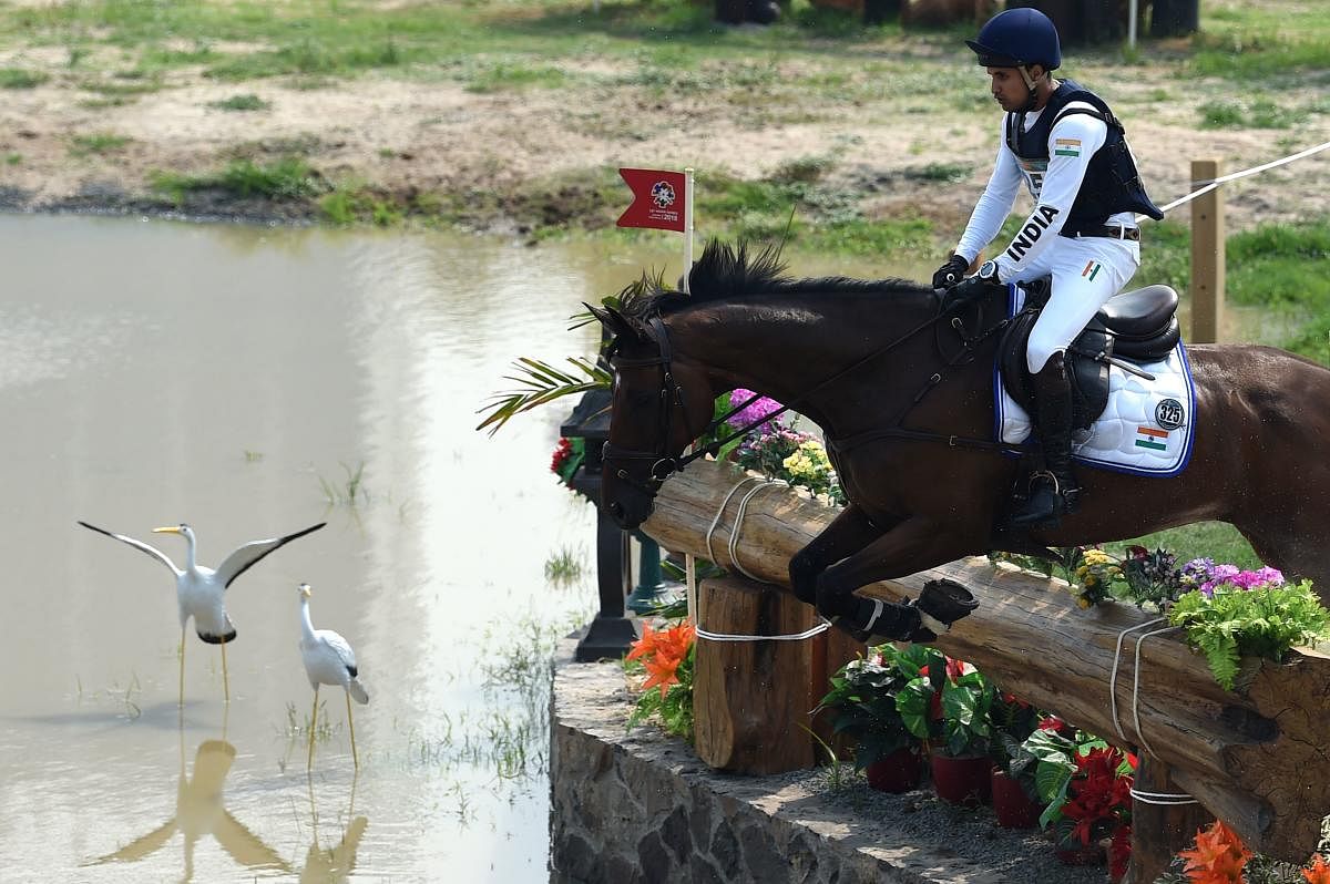 Fouaad Mirza competes in the eventing team and individual cross country event at the equestrian competitions at the Asian Games in Jakarta on Sunday. AFP