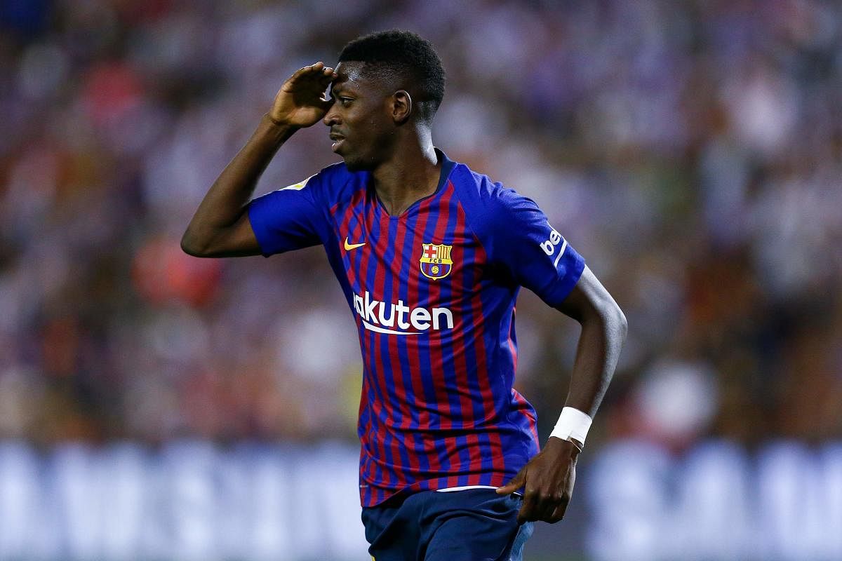 Barcelona's Ousmane Dembele celebrates after scoring against Real Valladolid in Valladolid on Sunday. AFP