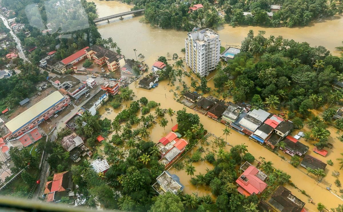 Flood affected areas of Chengannur seen from an Indian Navy helicopter, at Alappuzha district of Kerala. PTI file photo