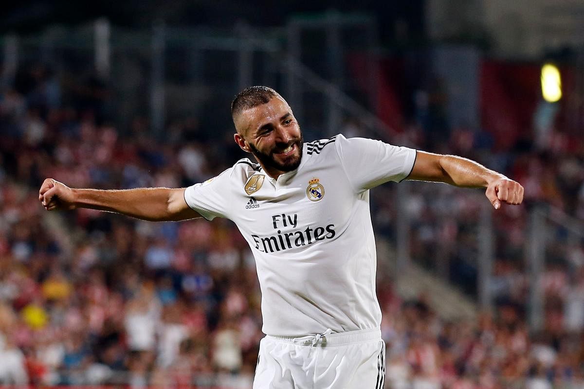 OVER THE MOON Real Madrid forward Karim Benzema celebrates his second goal against Girona FC on Sunday. AFP