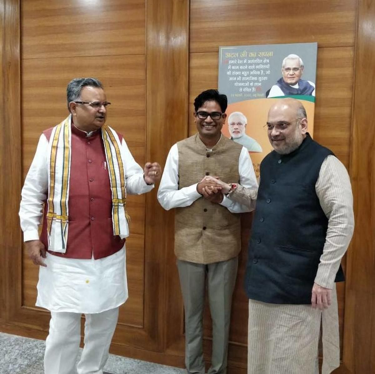 The photo tweeted by O P Choudhary, of him with BJP chief Amit Shah and Chhattisgarh Chief Minister Raman Singh. Twitter