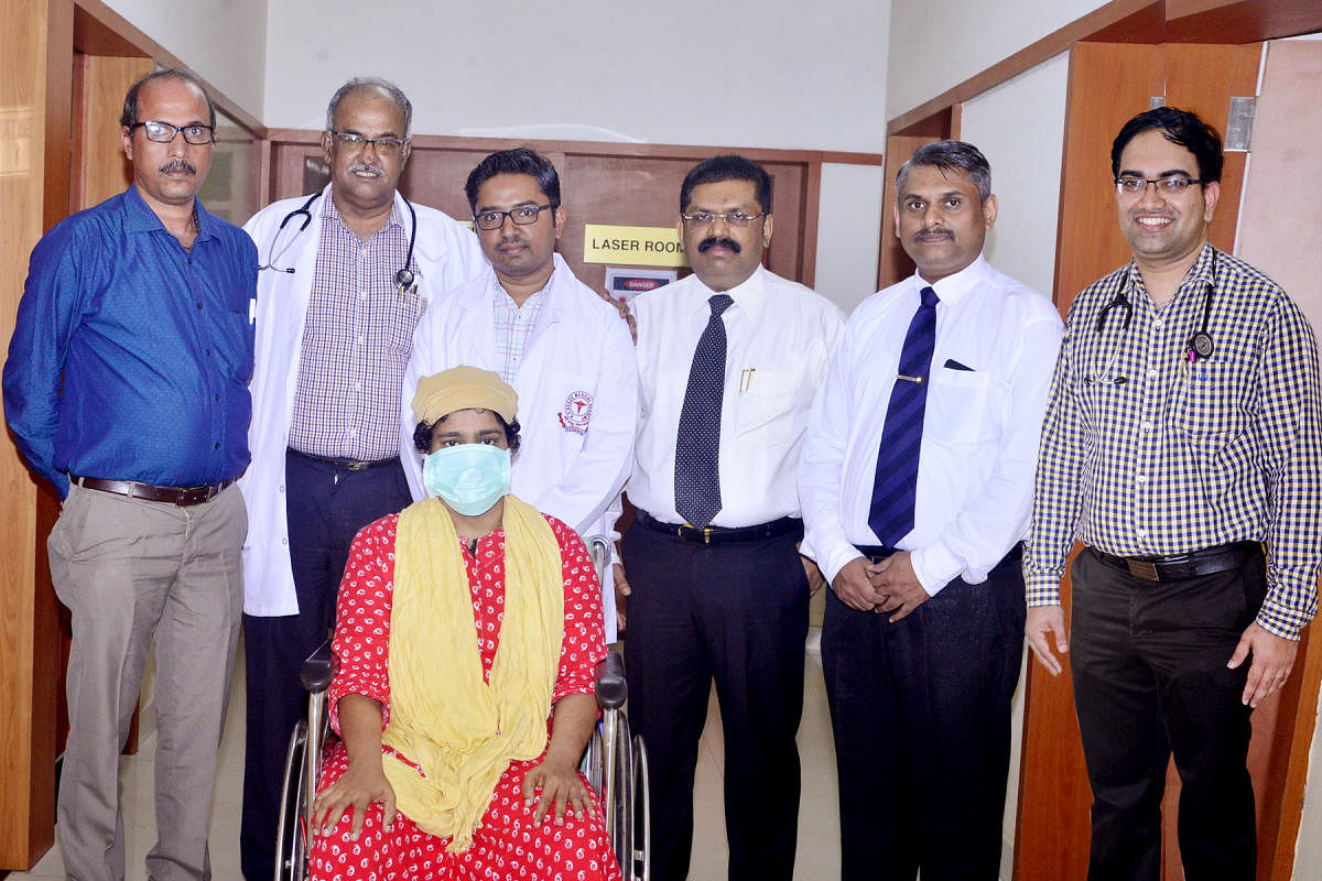 The doctors of Justice K S Hegde Charitable Hospital along with a patient.