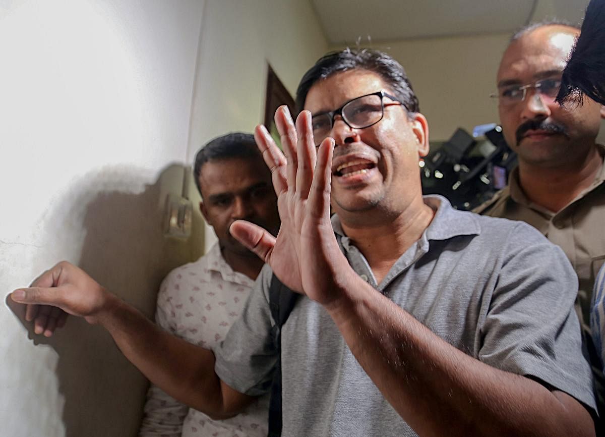 Arun Ferreira, a human rights activist and lawyer, after he was arrested by the Pune police in connection with Bhima Koregaon violence case, in Mumbai. PTI Photo