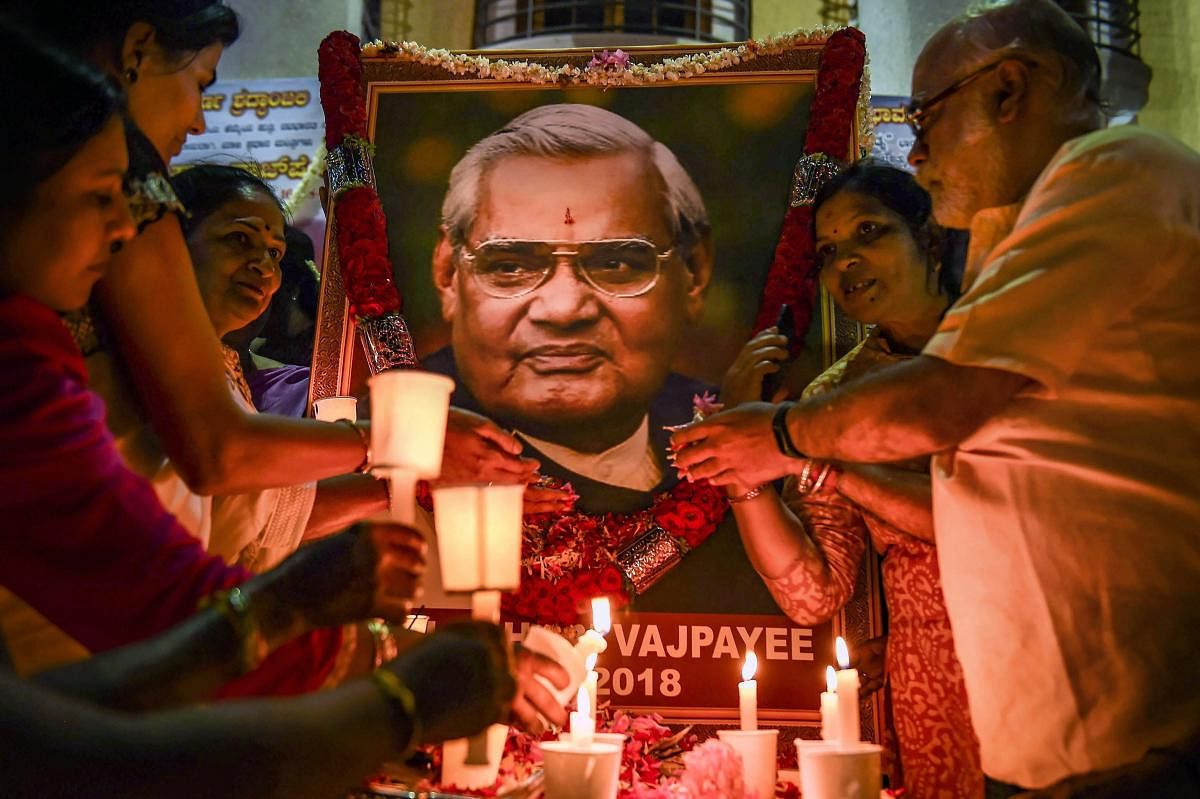 BJP workers pay tribute to former prime minister Atal Bihari Vajpayee, in Bengaluru. (PTI File Photo)
