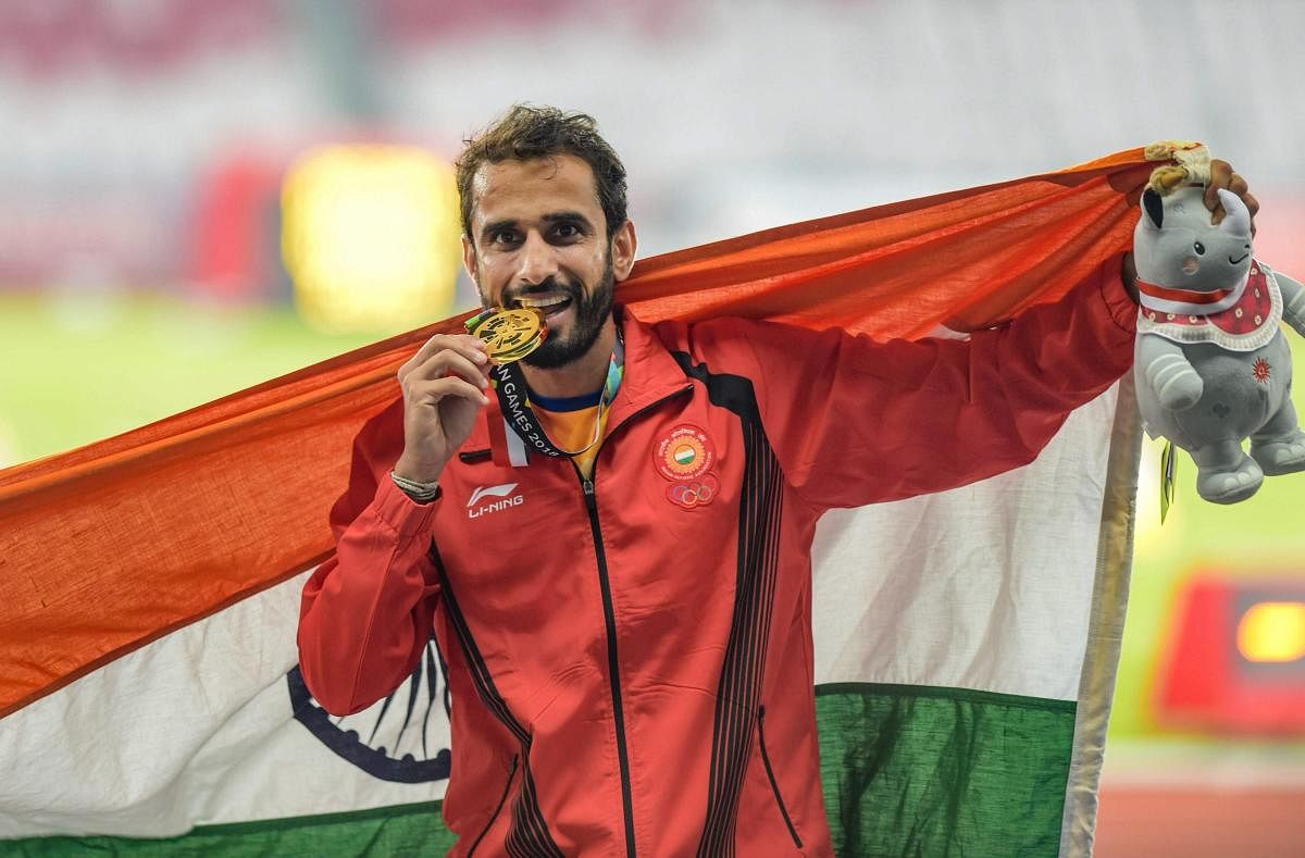 Men's 800m Gold medalist Manjit Singh at the 18th Asian Games, in Jakarta on Tuesday. (PTI Photo)