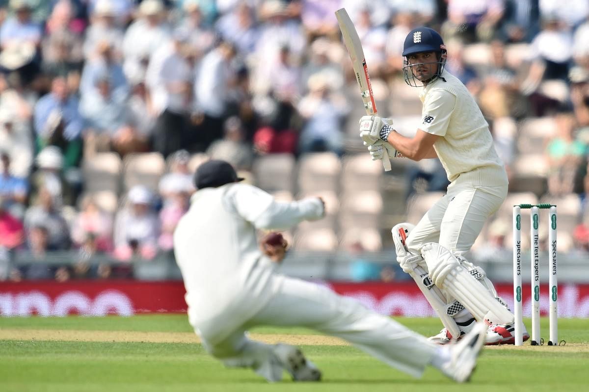 England's Alastair Cook watches as he is caught by India captain Virat Kohli on the opening day of the fourth Test in Southampton on Thursday. AFP