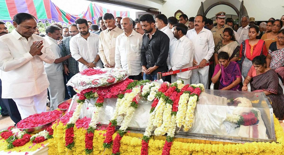 Telangana Chief Minister K Chandrashekar Rao with Andhra Pradesh Chief Minister N Chandrababu Naidu pay their tribute to former Rajya Sabha MP Nandamuri Harikrishna, who died due to a road accident in Nalgonda, in Hyderabad on Wednesday, Aug 29, 2018. PTI