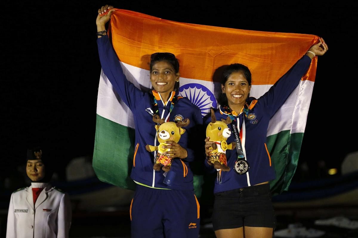2018 Asian Games - 49er FX Women Race 15 victory ceremony - Indonesia National Sailing Center - Jakarta, Indonesia - August 31, 2018 - Silver medalists Gautham Varsha and Shervegar Sweta of India pose. REUTERS