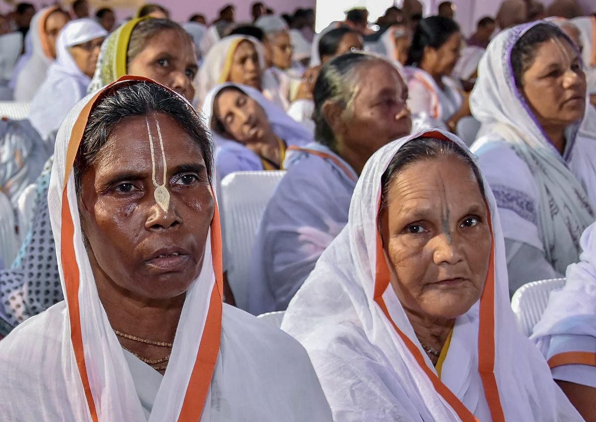 Widows attend the inauguration programme of Krishna Kutir, a home for 1000 widows, in Vrindavan near Mathura on Friday, Aug 31, 2018. (PTI Photo)