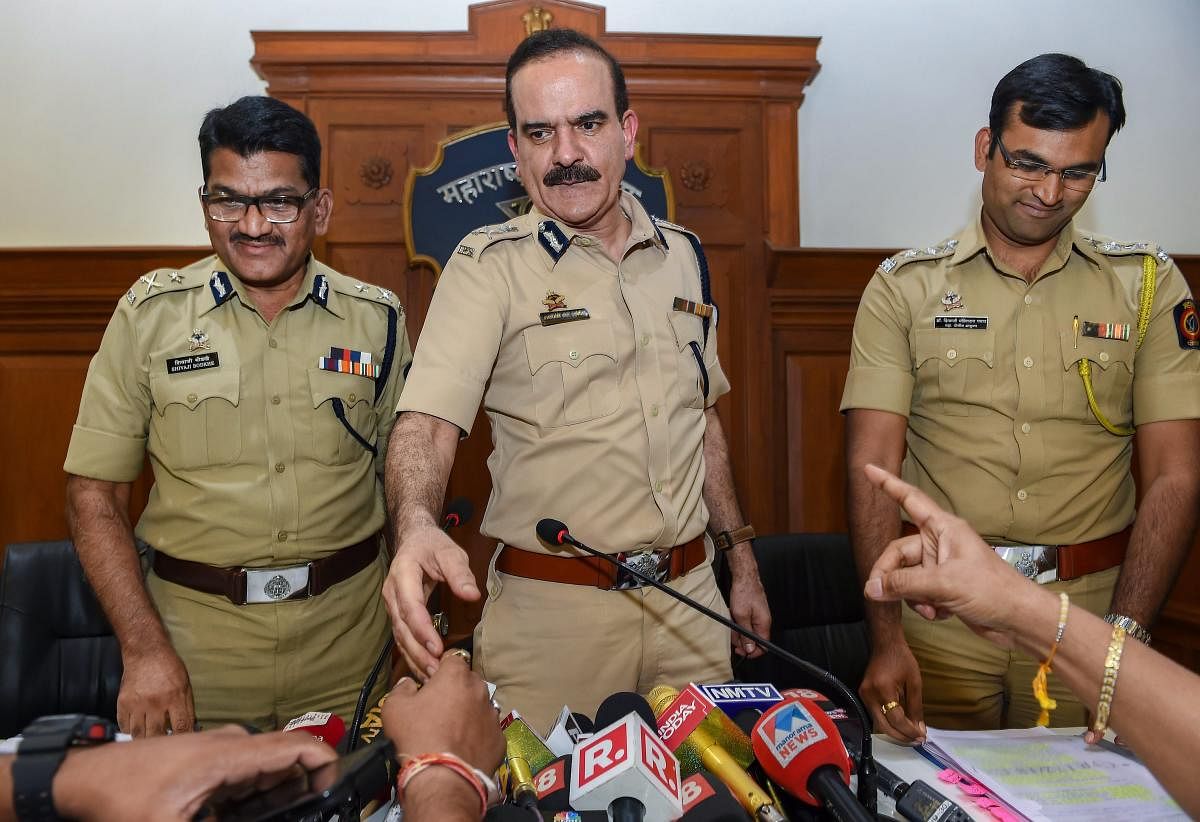 Maharashtra Police ADG (Law and Order) Param Bir Singh, with Pune's Additional CP Shivaji Bodke (L), at a press conference about the house arrest of rights activists in Bhima Koregaon case, in Mumbai on Friday. PTI
