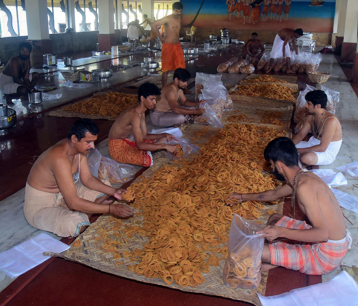 Chakkulis being readied for distribution among devotees during Vitla Pindi celebrations in Udupi.