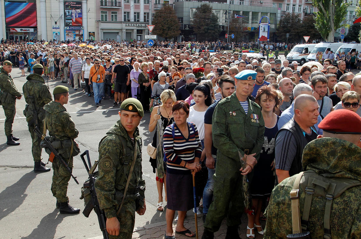 People wait in line to pay their last respects to Prime Minister of the self-proclaimed Donetsk People's Republic Alexander Zakharchenko in Donetsk, Ukraine, September 2, 2018. REUTERS