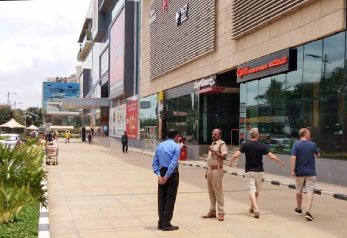 Fire department officials cleared two-wheeler parking and shops on the driveway at Golden Heights mall in Rajajinagar. Photo by Fire and Emergency Services