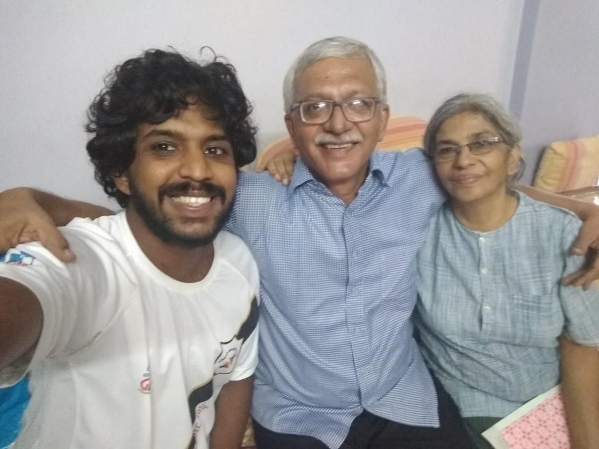 Vernon Gonsalves, with wife Susan Abraham and son Sagar Abraham-Gonsalves, minutes before he was arrested by the Pune Police last week.