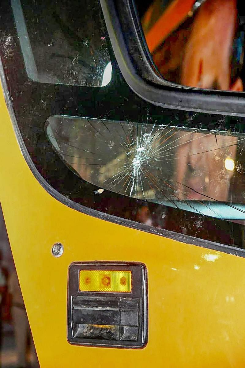 A view of the damaged vehicle in which Madhya Pradesh Chief Minister Shivraj Singh Chouhan was travelling. Miscreants threw stones at the vehicle while Chouhan was on a state tour ahead of Assembly polls, in Sidhi on Sunday. PTI