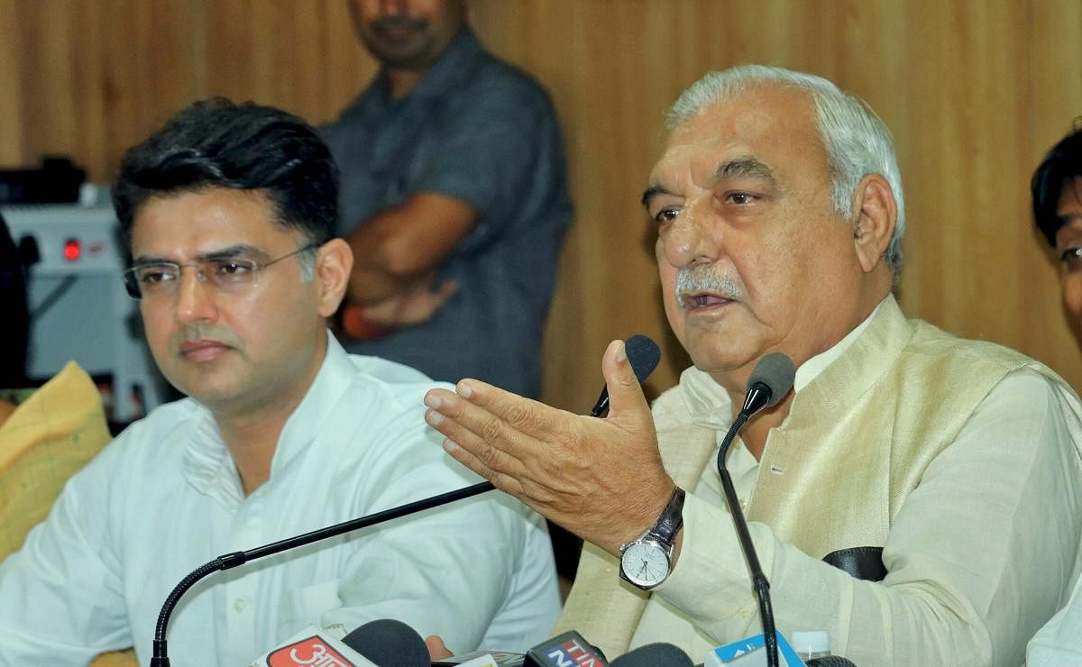 Senior Congress leader and former Haryana Chief Minister Bhupendra Singh Hooda along with RPCC President Sachin Pilot addresses the media in Jaipur on Tuesday, Sept 4, 2018. (PTI Photo)