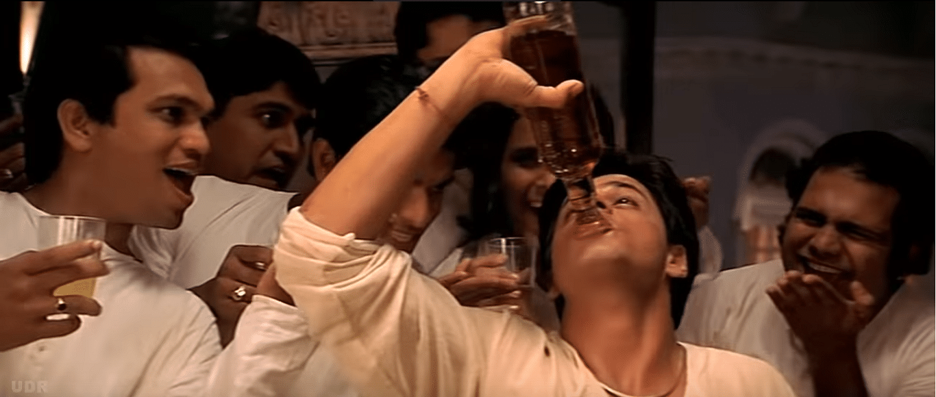 Shah Rukh Khan as the booze-loving Devdas.