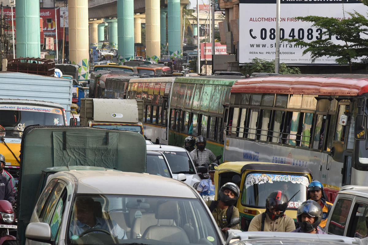 Traffic pile-ups like this at the Sarakki signal near JP Nagar are a daily affair. DH PHOTO/S K Dinesh