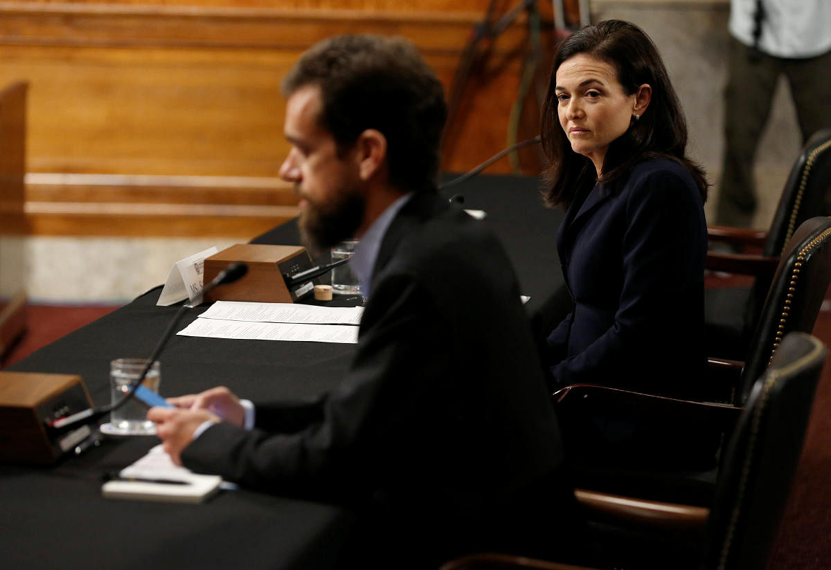Twitter CEO Jack Dorsey and Facebook COO Sheryl Sandberg testify before a Senate Intelligence Committee hearing on foreign influence operations on social media platforms on Capitol Hill in Washington, September 5, 2018. (REUTERS)