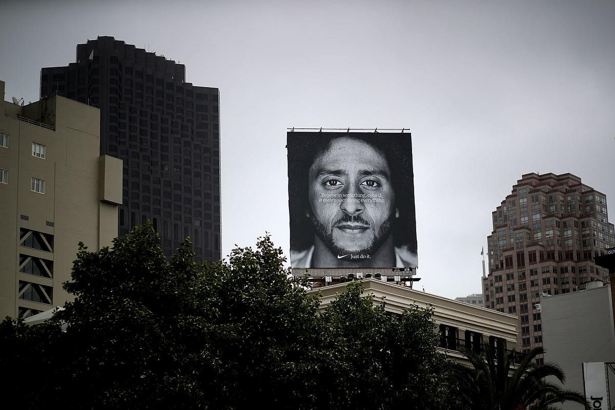 Nike has unveiled its first "Just Do It" ad narrated by Colin Kaepernick, a spot scheduled to air during the NFL season opener on Thursday night. (AFP Photo)