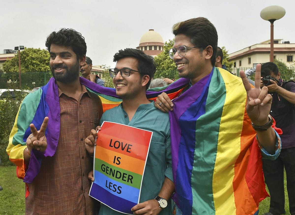 People react after the Supreme Court verdict which decriminalises consensual gay sex, in New Delhi, Thursday, Sept 6, 2018. PTI photo