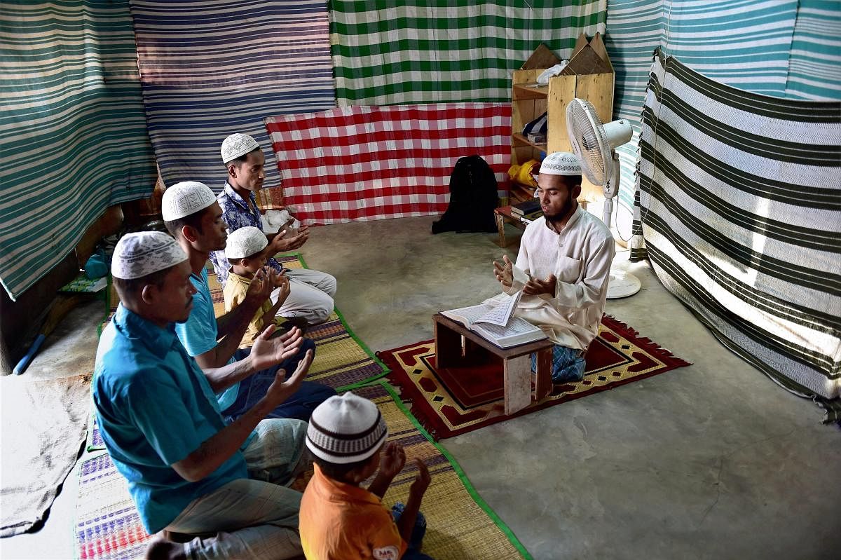 Rohingya Muslim refugees offering prayers at a camp at Kelambakkam in Chennai. PTI file photo