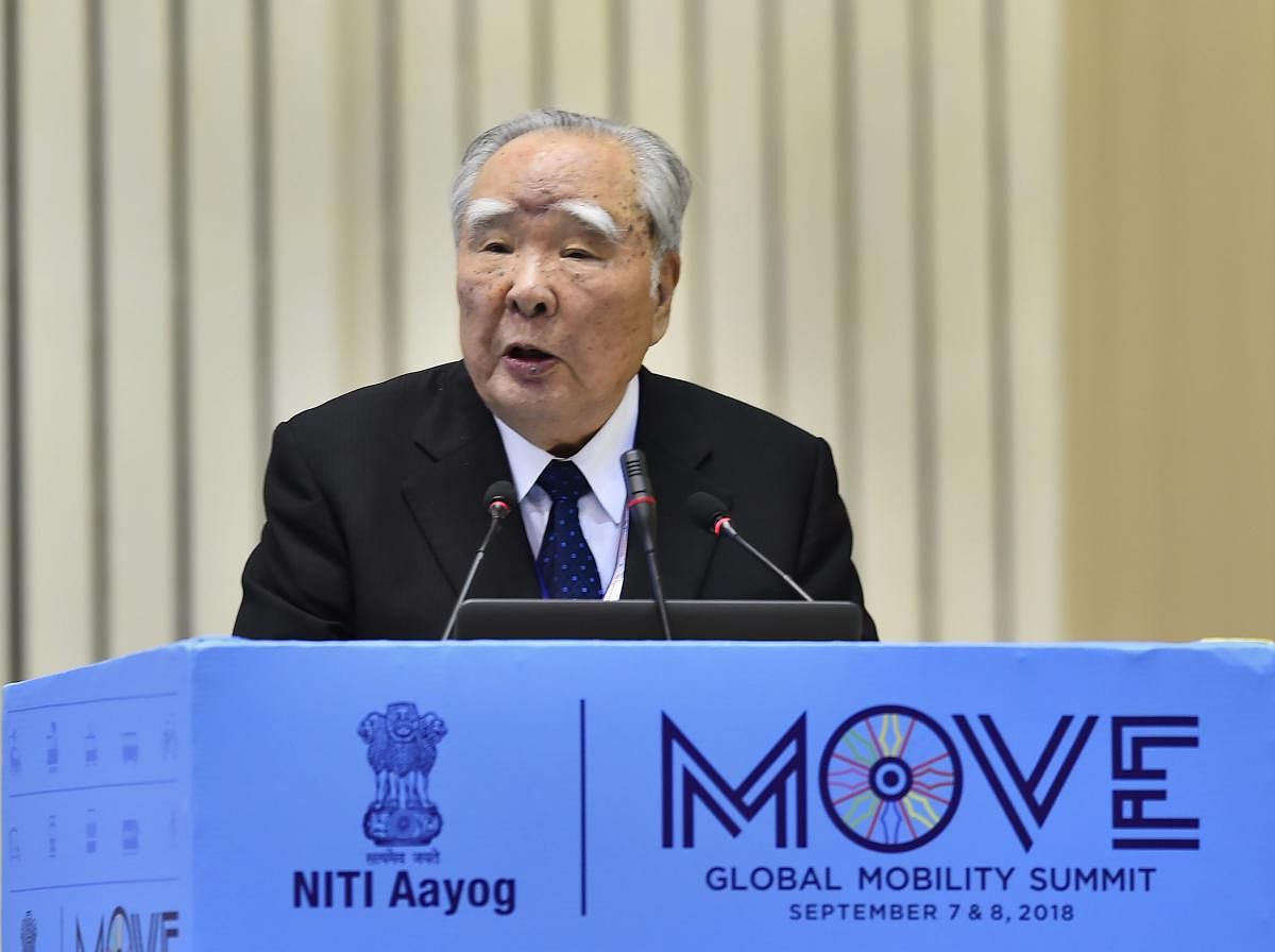Suzuki Motor Corporation Chairperson Osamu Suzuki addresses at the 'Move: Global Mobility Summit', in New Delhi on Friday. PTI