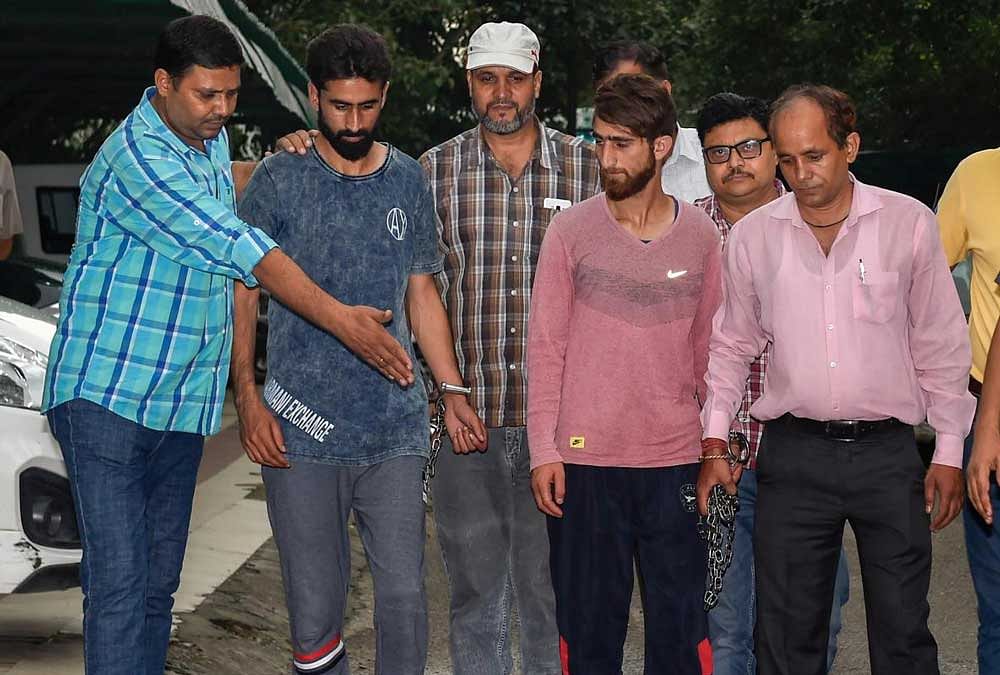 Delhi Police's Special Cell arrest two suspected terrorists, Parwez Rashid and Jamshed Jahoor, affiliated to the Islamic State in Jammu and Kashmir (ISJK) organisation, in New Delhi. PTI Photo 