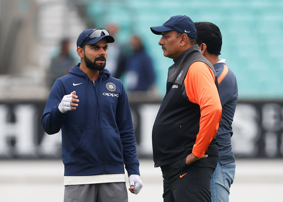Skipper Virat Kohli (left) and head coach Ravi Shastri. Reuters